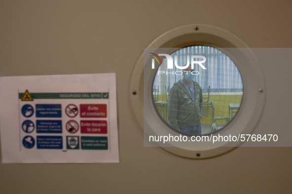 Ricardo Fernandez, secretary of the Norena secondary education institute checks one of the classrooms prepared with sanitary and protective...