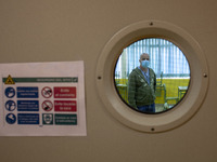 Ricardo Fernandez, secretary of the Norena secondary education institute checks one of the classrooms prepared with sanitary and protective...