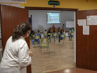 A teacher counts the students who attend the first voluntary review class for the university entrance exam, the EBAU in Norena, Spain, on Ju...