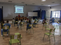 An information class to face the entrance exam to the university, EBAU, keeping the safety distances between students  in Norena, Spain, on...