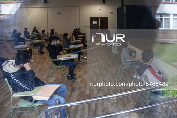 An information class to face the entrance exam to the university, EBAU, keeping the safety distances between students  in Norena, Spain, on...