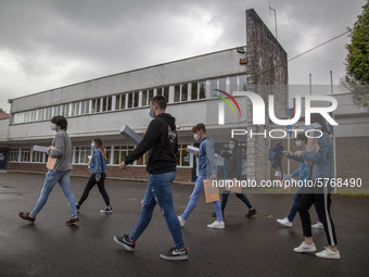 Several students leave the educational center with the documentation to sit for the university entrance exam, EBAU in Norena, Spain, on June...