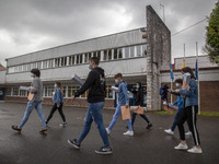 Several students leave the educational center with the documentation to sit for the university entrance exam, EBAU in Norena, Spain, on June...