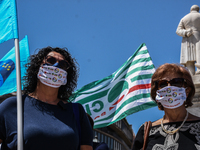 Members of the CGIL, CISL, UIL and GILDA unions, from the school sector, protested against the government of Giuseppe Conte in front of the...