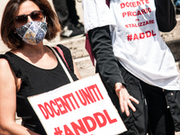 Members of major teachers' trade unions stage a demonstration in front of the Ministry of Education on June 8, 2020 in Rome, Italy as the co...