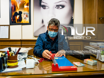 A studio photographer at work in Molfetta, Italy  on 8 June 2020.
The work of the studio photographers, after the pandemic, unlike the othe...