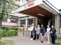 A group of young adults pose to be photographed before taking final graduation exam, called maturity exams in the First General Education Hi...