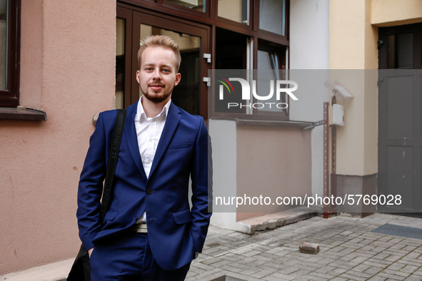 A young adult poses to be photographed before taking final graduation exams, called maturity exams in the First General Education High Schoo...