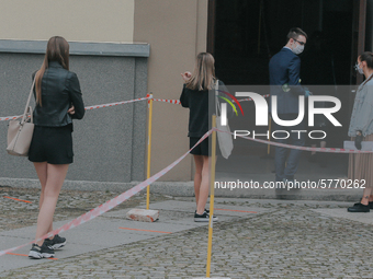 Students of the 12th high school are waiting for entry for the matura exam during pandemic on June 9, 2020 in Wroclaw, Poland. (