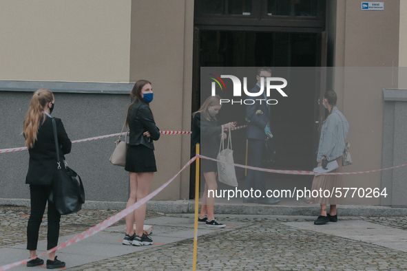 Students of the 12th high school are waiting for entry for the matura exam during pandemic on June 9, 2020 in Wroclaw, Poland. 