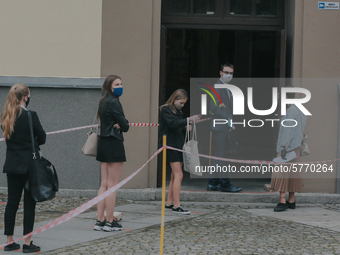 Students of the 12th high school are waiting for entry for the matura exam during pandemic on June 9, 2020 in Wroclaw, Poland. (