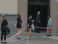 Students of the 12th high school are waiting for entry for the matura exam during pandemic on June 9, 2020 in Wroclaw, Poland. (