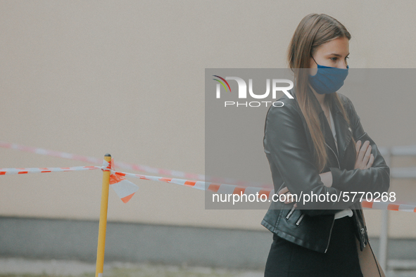 Students of the 12th high school are waiting for entry for the matura exam during pandemic on June 9, 2020 in Wroclaw, Poland. 