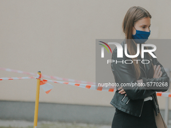 Students of the 12th high school are waiting for entry for the matura exam during pandemic on June 9, 2020 in Wroclaw, Poland. (