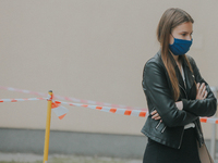 Students of the 12th high school are waiting for entry for the matura exam during pandemic on June 9, 2020 in Wroclaw, Poland. (