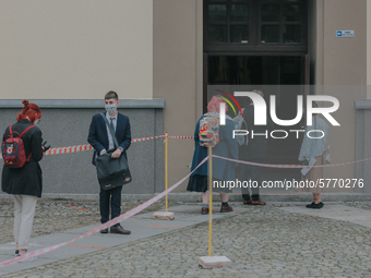 Students of the 12th high school are waiting for entry for the matura exam during pandemic on June 9, 2020 in Wroclaw, Poland. (