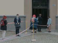 Students of the 12th high school are waiting for entry for the matura exam during pandemic on June 9, 2020 in Wroclaw, Poland. (