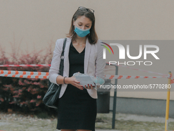 Students of the 12th high school are waiting for entry for the matura exam during pandemic on June 9, 2020 in Wroclaw, Poland. (