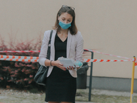 Students of the 12th high school are waiting for entry for the matura exam during pandemic on June 9, 2020 in Wroclaw, Poland. (