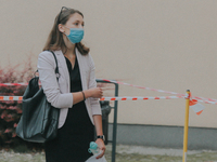 Students of the 12th high school are waiting for entry for the matura exam during pandemic on June 9, 2020 in Wroclaw, Poland. (