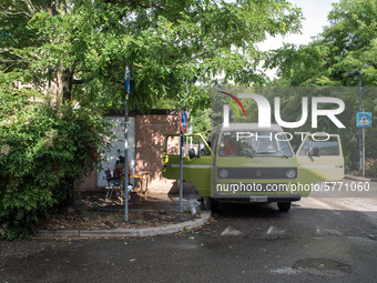 Giulia Zaffagnini, middle school teacher, and one of her pupils during a lesson in a van under the student's house while the schools are clo...