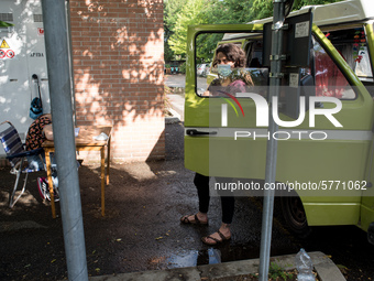 Giulia Zaffagnini, middle school teacher, and one of her pupils during a lesson in a van under the student's house while the schools are clo...