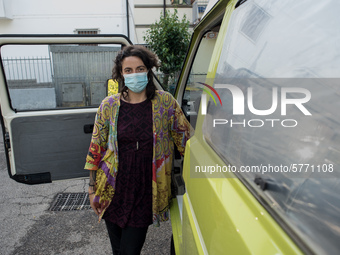 Giulia Zaffagnini wearing her mask. Giulia is a teacher in charge of lessons for foreign middle school pupils with Italian language learning...