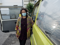 Giulia Zaffagnini wearing her mask. Giulia is a teacher in charge of lessons for foreign middle school pupils with Italian language learning...