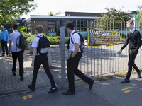   Year 10 pupils enter the school. Ortu Gable Hall School in Corringham, Essex return after a long break due to the COVID-19 pandemic on Tue...