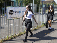   Year 10 pupils enter the school. Ortu Gable Hall School in Corringham, Essex return after a long break due to the COVID-19 pandemic on Tue...