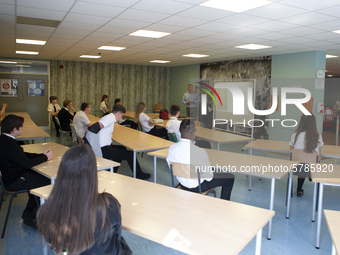   Year 10 pupils watch on as the head teacher gives a presentation. Ortu Gable Hall School in Corringham, Essex return after a long break du...