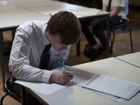   A year 10 pupil writing. Ortu Gable Hall School in Corringham, Essex return after a long break due to the COVID-19 pandemic on Tuesday 16t...