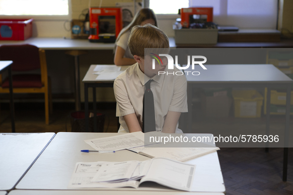   A year 10 pupil with work in front of him. Ortu Gable Hall School in Corringham, Essex return after a long break due to the COVID-19 pande...