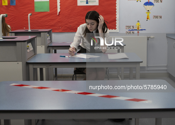  A Year 10 pupil doing her work. Ortu Gable Hall School in Corringham, Essex return after a long break due to the COVID-19 pandemic on Tuesd...