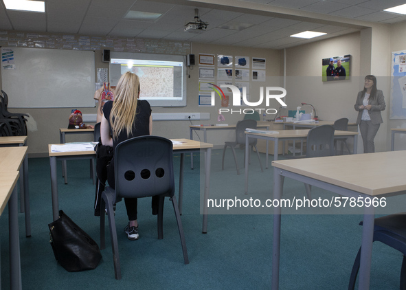   A year 12 pupil watches on as the teacher shows a video. Ortu Gable Hall School in Corringham, Essex return after a long break due to the...