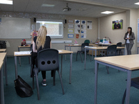   A year 12 pupil watches on as the teacher shows a video. Ortu Gable Hall School in Corringham, Essex return after a long break due to the...