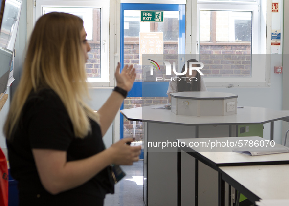  A Year 10 pupil watches on at the teacher . Ortu Gable Hall School in Corringham, Essex return after a long break due to the COVID-19 pande...