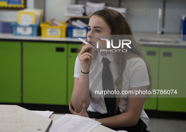   A Year 10 pupil doing work. Ortu Gable Hall School in Corringham, Essex return after a long break due to the COVID-19 pandemic on Tuesday...