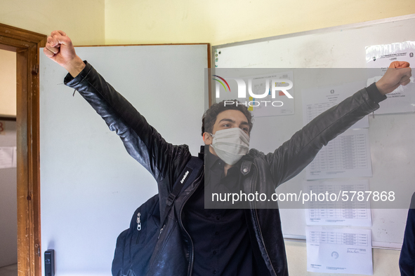 A student exults after the end of the exam in Turin, Italy on 17th June 2020. The final high school exam represents a return to class for st...