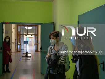 A student waits for her turn to begin the exam in Turin, Italy 17th June 2020. . The final high school exam represents a return to class for...