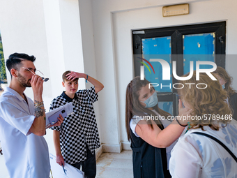 Students outside the school, immediately after the state exam in Molfetta at the Don Tonino Bello High School in Molfetta, Italy on June 18,...