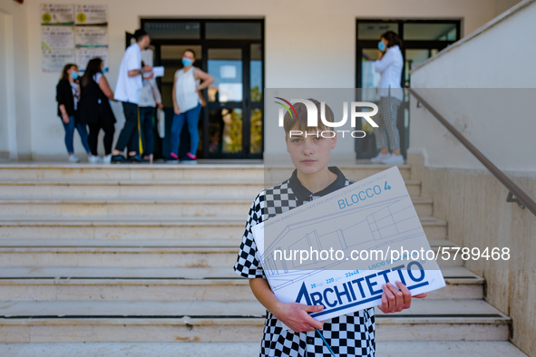 A student poses after taking the State Exam in Molfetta at the Don Tonino Bello High School in Molfetta, Italy on June 18, 2020.
The State...