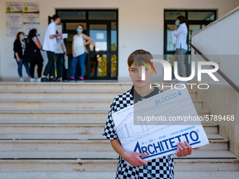 A student poses after taking the State Exam in Molfetta at the Don Tonino Bello High School in Molfetta, Italy on June 18, 2020.
The State...