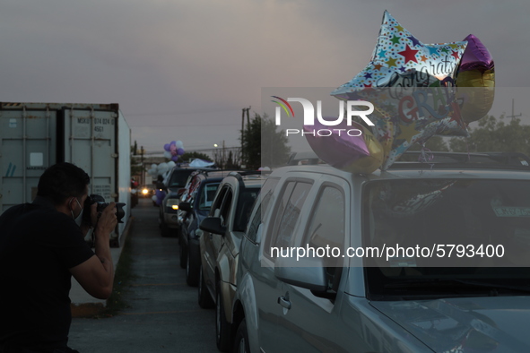 Ciudad Juarez High school students receive their diplomas inside their vehicles at a ''drive in'' graduation ceremony held at the Centro Cul...