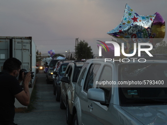 Ciudad Juarez High school students receive their diplomas inside their vehicles at a ''drive in'' graduation ceremony held at the Centro Cul...