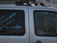 Ciudad Juarez High school students receive their diplomas inside their vehicles at a ''drive in'' graduation ceremony held at the Centro Cul...