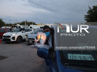 Ciudad Juarez High school students receive their diplomas inside their vehicles at a ''drive in'' graduation ceremony held at the Centro Cul...