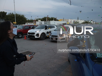 Ciudad Juarez High school students receive their diplomas inside their vehicles at a ''drive in'' graduation ceremony held at the Centro Cul...