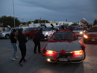 Ciudad Juarez High school students receive their diplomas inside their vehicles at a ''drive in'' graduation ceremony held at the Centro Cul...