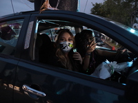 Ciudad Juarez High school students receive their diplomas inside their vehicles at a ''drive in'' graduation ceremony held at the Centro Cul...